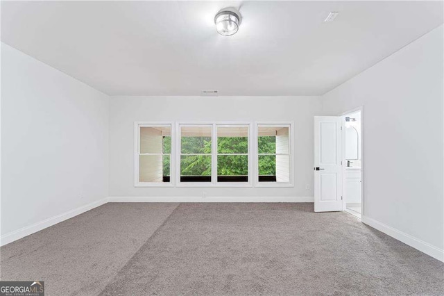 5705 Registry Oaks Ln SE, Mableton, GA 30126 - carpeted spare room with baseboards