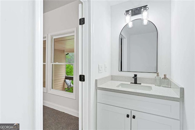 5705 Registry Oaks Ln SE, Mableton, GA 30126 - bathroom with vanity and baseboards