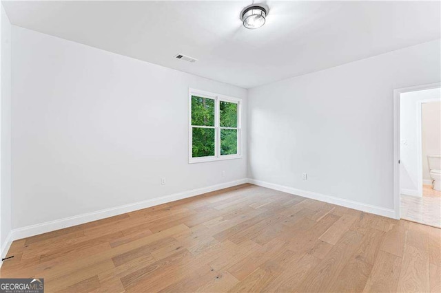 5705 Registry Oaks Ln SE, Mableton, GA 30126 - empty room featuring light wood-style floors and baseboards