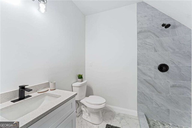 5705 Registry Oaks Ln SE, Mableton, GA 30126 - full bath featuring tiled shower, marble finish floors, toilet, and vanity