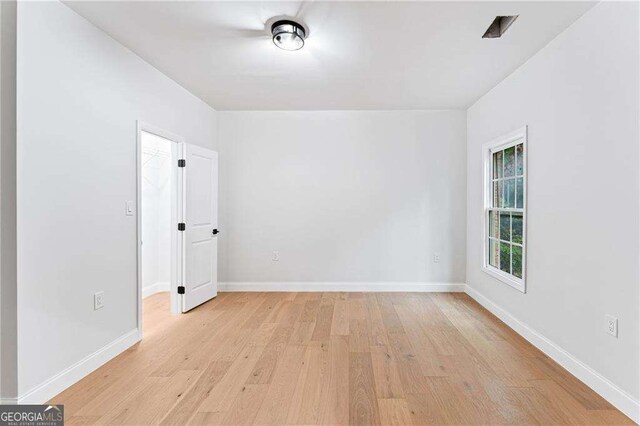 5705 Registry Oaks Ln SE, Mableton, GA 30126 - spare room featuring light wood-type flooring and baseboards