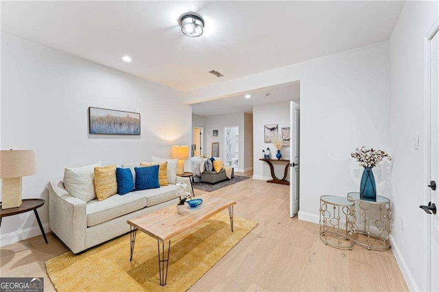 5705 Registry Oaks Ln SE, Mableton, GA 30126 - living area featuring light wood-style floors, recessed lighting, and baseboards