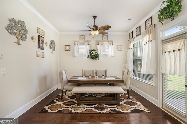 6861 Louis Dr, Locust Grove, GA 30248 - dining room featuring hardwood / wood-style flooring, plenty of natural light, a ceiling fan, and ornamental molding