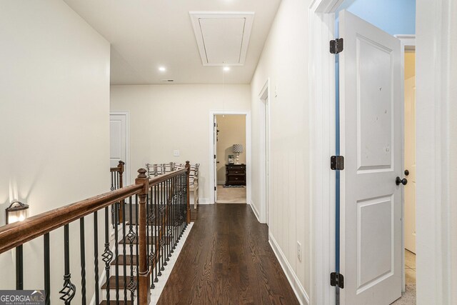 6861 Louis Dr, Locust Grove, GA 30248 - corridor with attic access, an upstairs landing, wood finished floors, recessed lighting, and baseboards