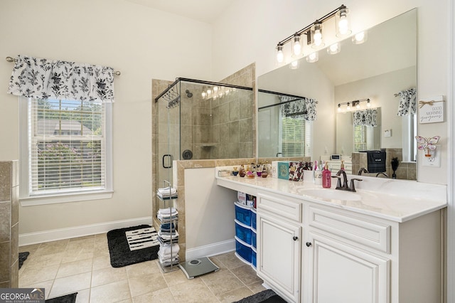 6861 Louis Dr, Locust Grove, GA 30248 - full bathroom featuring vanity, a shower stall, plenty of natural light, and baseboards