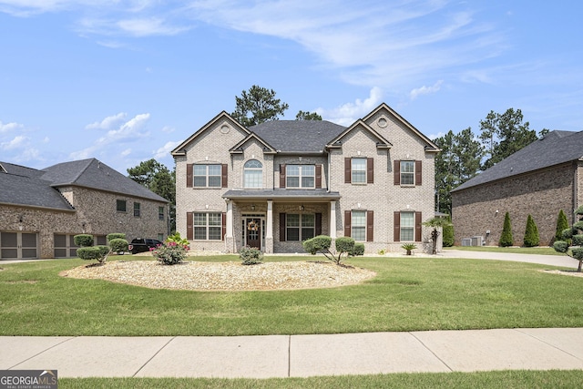 6861 Louis Dr, Locust Grove, GA 30248 - view of front of house featuring brick siding and a front lawn