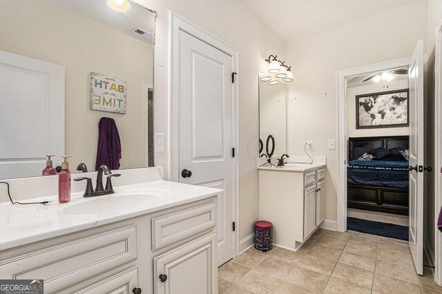 6861 Louis Dr, Locust Grove, GA 30248 - ensuite bathroom with two vanities