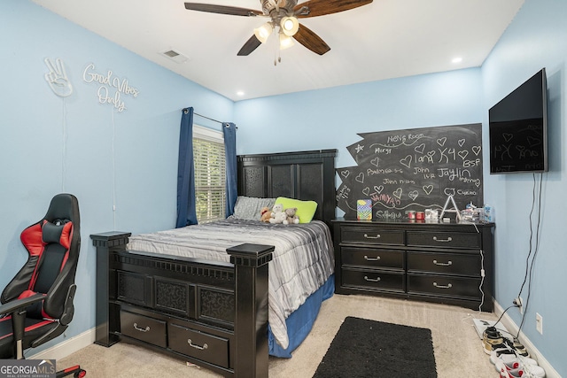 6861 Louis Dr, Locust Grove, GA 30248 - bedroom with light carpet, ceiling fan, and baseboards