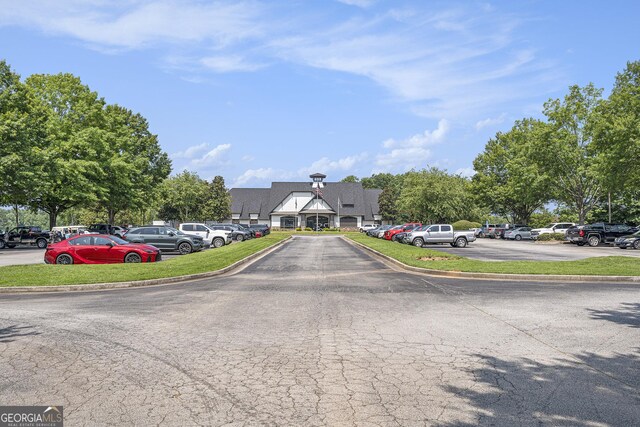 6861 Louis Dr, Locust Grove, GA 30248 - view of front facade with uncovered parking