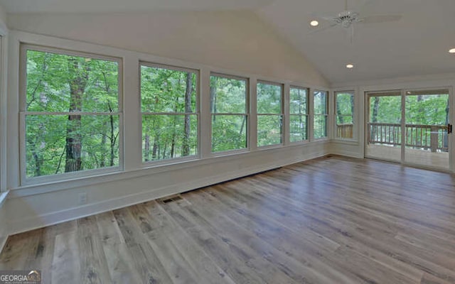 340 Currahee Trl, Toccoa, GA 30577 - unfurnished sunroom with lofted ceiling, healthy amount of natural light, wood finished floors, recessed lighting, and a wooden deck