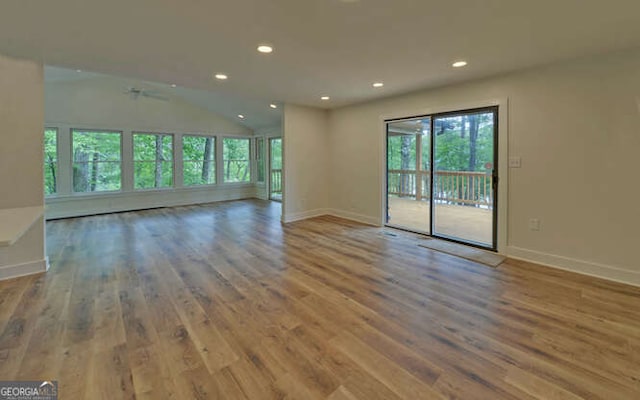 340 Currahee Trl, Toccoa, GA 30577 - unfurnished room featuring plenty of natural light, wood finished floors, recessed lighting, baseboards, and vaulted ceiling