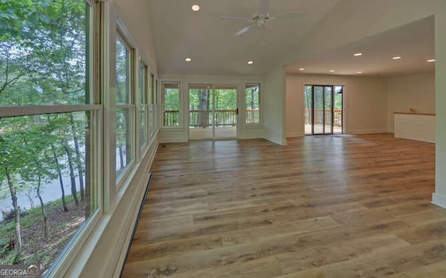 340 Currahee Trl, Toccoa, GA 30577 - unfurnished sunroom featuring wood finished floors, vaulted ceiling, and recessed lighting