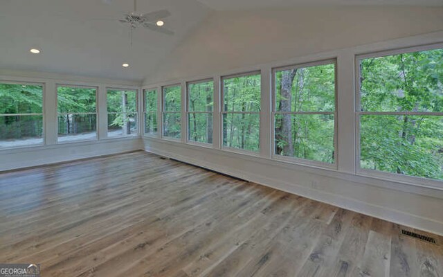 340 Currahee Trl, Toccoa, GA 30577 - unfurnished sunroom with lofted ceiling, wood finished floors, and recessed lighting