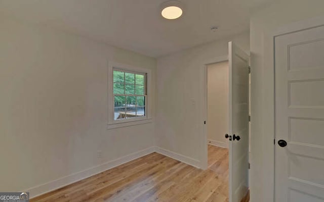 340 Currahee Trl, Toccoa, GA 30577 - unfurnished room with baseboards and light wood-style flooring