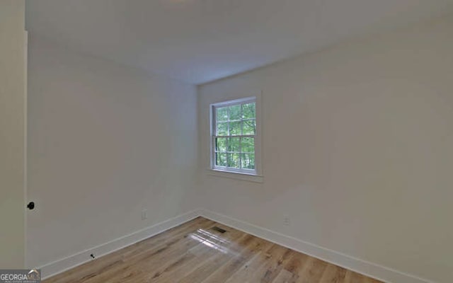 340 Currahee Trl, Toccoa, GA 30577 - spare room featuring baseboards and light wood-type flooring
