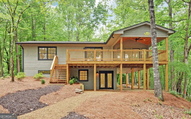 340 Currahee Trl, Toccoa, GA 30577 - view of front of house with a wooden deck, stairs, ceiling fan, a carport, and french doors