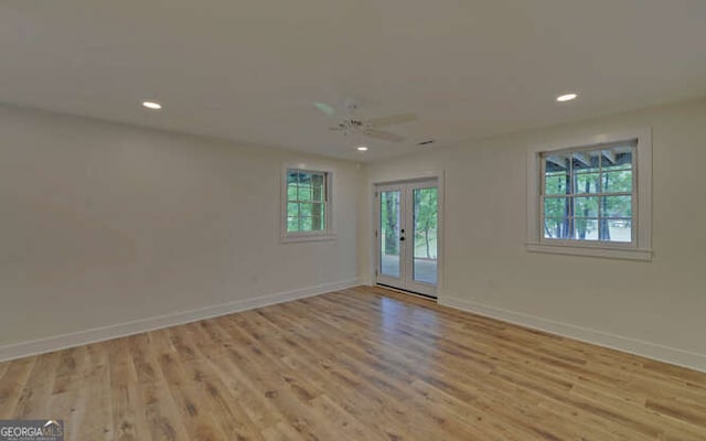 340 Currahee Trl, Toccoa, GA 30577 - empty room featuring light wood-style flooring, baseboards, recessed lighting, and french doors