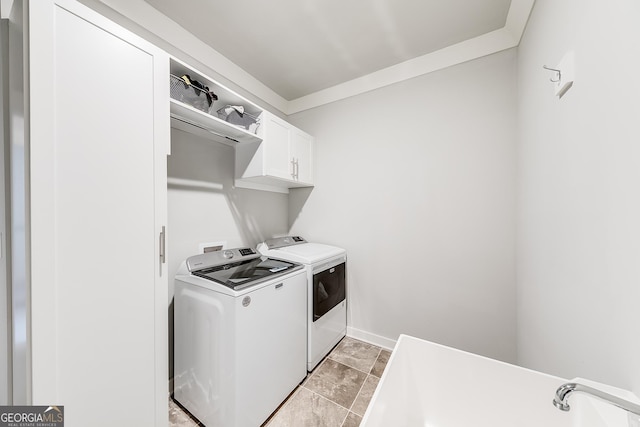 4581 Blacksmith Ln, Jefferson, GA 30549 - laundry area featuring independent washer and dryer, cabinet space, and baseboards