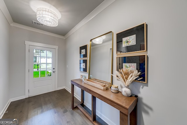 4581 Blacksmith Ln, Jefferson, GA 30549 - entryway featuring crown molding, a chandelier, dark wood-style floors, and baseboards