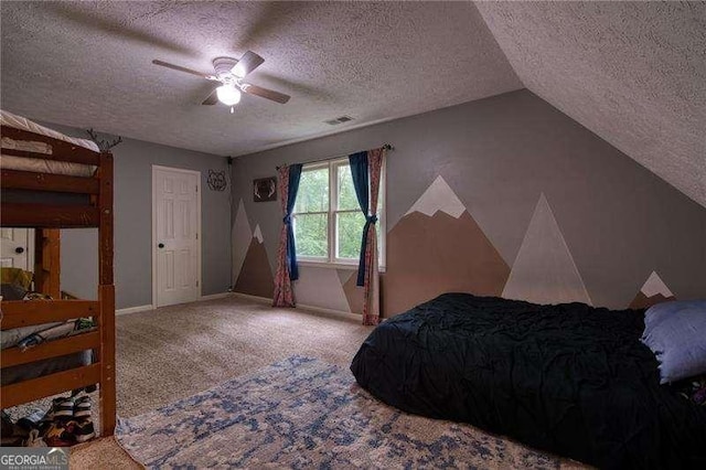 34 Sassafras Grv, Dawsonville, GA 30534 - carpeted bedroom featuring a textured ceiling, baseboards, a ceiling fan, and vaulted ceiling