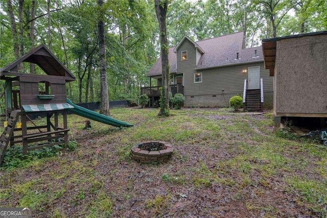 34 Sassafras Grv, Dawsonville, GA 30534 - view of yard with a fire pit and a playground