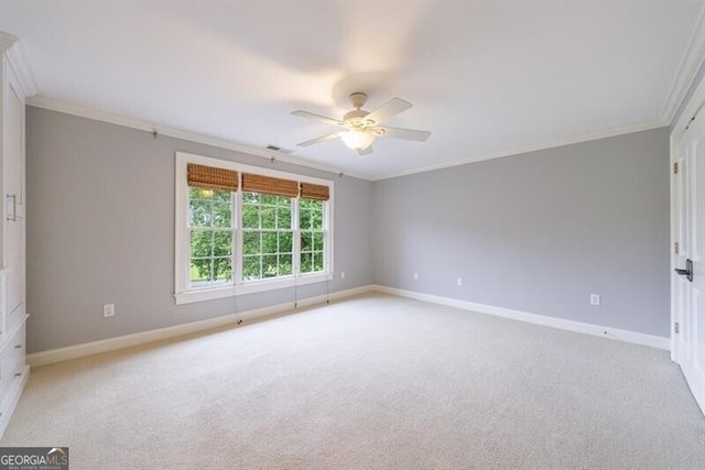 7 Hogan Ln NW, Rome, GA 30165 - empty room with crown molding, light colored carpet, and ceiling fan
