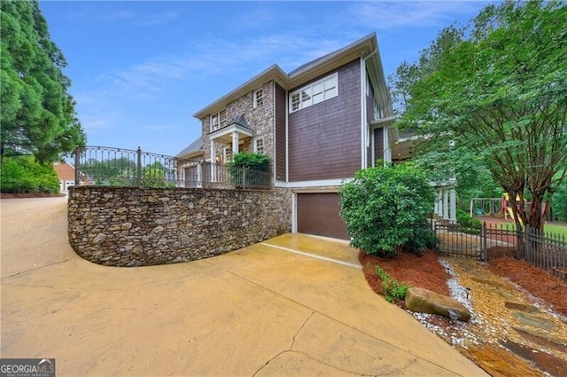 7 Hogan Ln NW, Rome, GA 30165 - view of front of house with an attached garage and concrete driveway