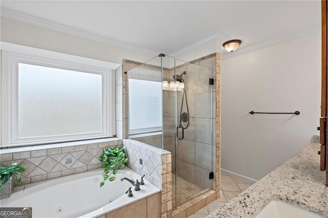 10735 Pinewalk Forest Cir, Alpharetta, GA 30022 - full bath with a whirlpool tub, a stall shower, crown molding, baseboards, and tile patterned flooring