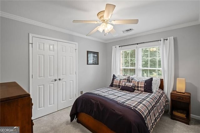 10735 Pinewalk Forest Cir, Alpharetta, GA 30022 - carpeted bedroom with a closet, ornamental molding, and ceiling fan