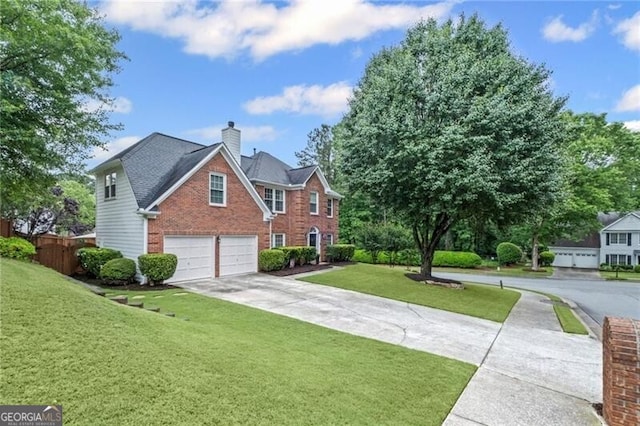 10735 Pinewalk Forest Cir, Alpharetta, GA 30022 - view of front of house with brick siding, an attached garage, concrete driveway, and a chimney