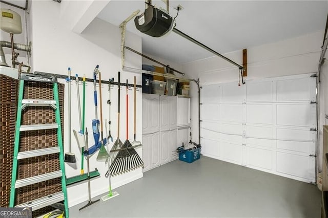 10735 Pinewalk Forest Cir, Alpharetta, GA 30022 - garage featuring a garage door opener