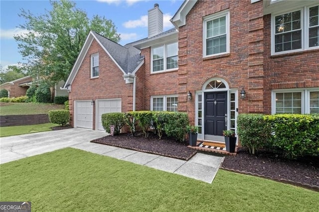 10735 Pinewalk Forest Cir, Alpharetta, GA 30022 - view of front of property with driveway, brick siding, a front lawn, an attached garage, and a chimney
