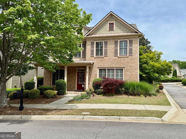 4916 Gathering Pl, Suwanee, GA 30024 - view of front of property with brick siding and board and batten siding