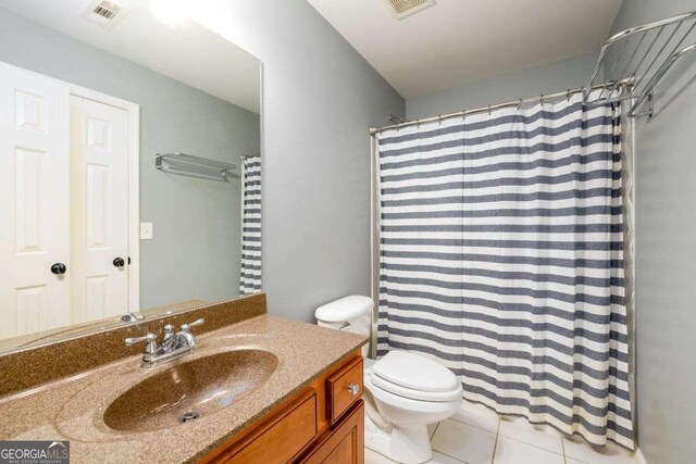 4916 Gathering Pl, Suwanee, GA 30024 - bathroom featuring tile patterned floors, vanity, and curtained shower