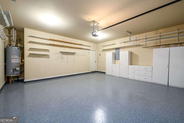4916 Gathering Pl, Suwanee, GA 30024 - garage featuring water heater, a garage door opener, and electric panel