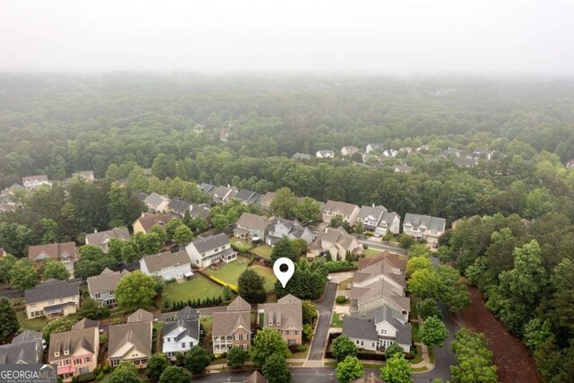 4916 Gathering Pl, Suwanee, GA 30024 - aerial view of residential area featuring a forest