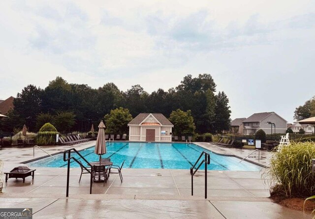 4916 Gathering Pl, Suwanee, GA 30024 - community pool with a patio area