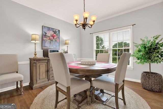224 Mountain View Dr, Woodstock, GA 30188 - dining space featuring a chandelier, wood finished floors, crown molding, and baseboards