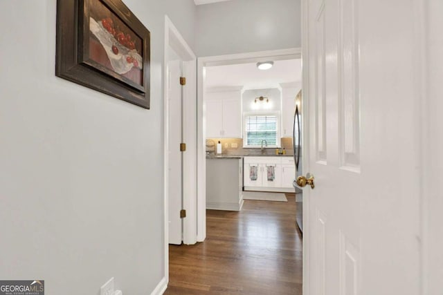 224 Mountain View Dr, Woodstock, GA 30188 - corridor with dark wood finished floors and a sink