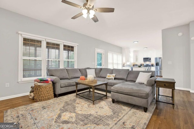 224 Mountain View Dr, Woodstock, GA 30188 - living room featuring wood finished floors, baseboards, and a ceiling fan