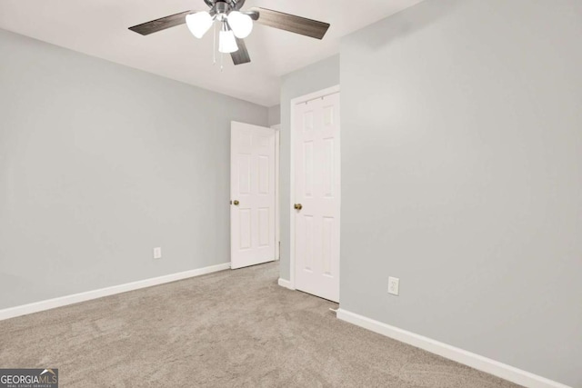 224 Mountain View Dr, Woodstock, GA 30188 - unfurnished bedroom featuring carpet, baseboards, and ceiling fan