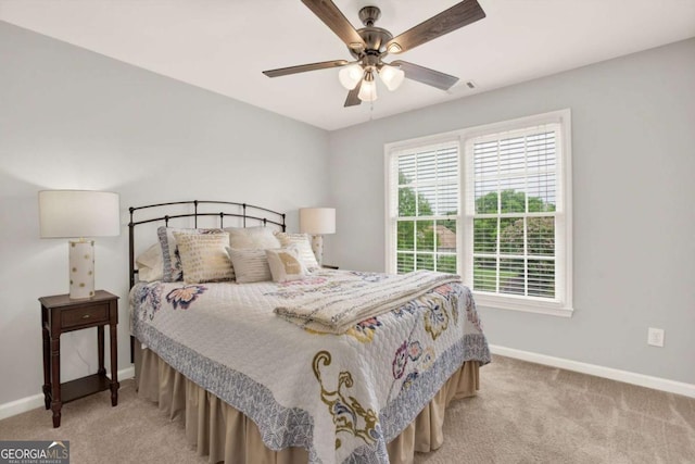 224 Mountain View Dr, Woodstock, GA 30188 - bedroom with light colored carpet, baseboards, and ceiling fan
