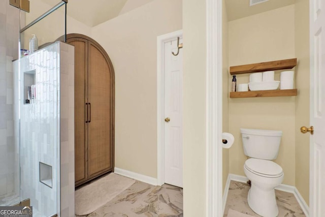 224 Mountain View Dr, Woodstock, GA 30188 - bathroom featuring marble finish floors, toilet, a tile shower, and baseboards