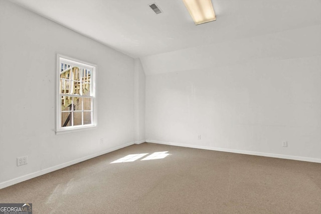 224 Mountain View Dr, Woodstock, GA 30188 - spare room featuring carpet floors, baseboards, and vaulted ceiling