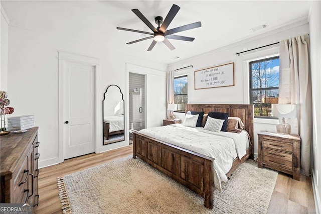 856 Ferguson Pl, Dallas, GA 30132 - bedroom with light wood finished floors and a ceiling fan