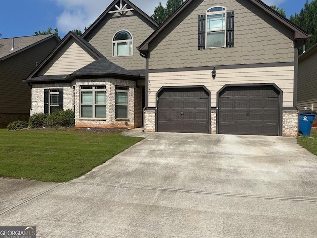 1749 Misselthrush Ln, Mcdonough, GA 30253 - view of front of property with a garage, a front lawn, and driveway