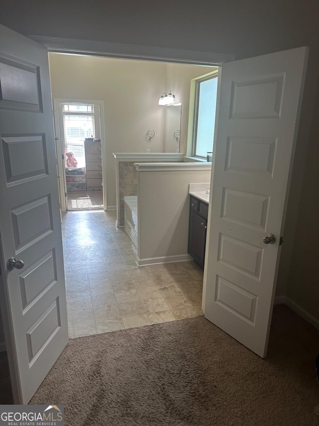 1749 Misselthrush Ln, Mcdonough, GA 30253 - full bathroom featuring vanity and a tub