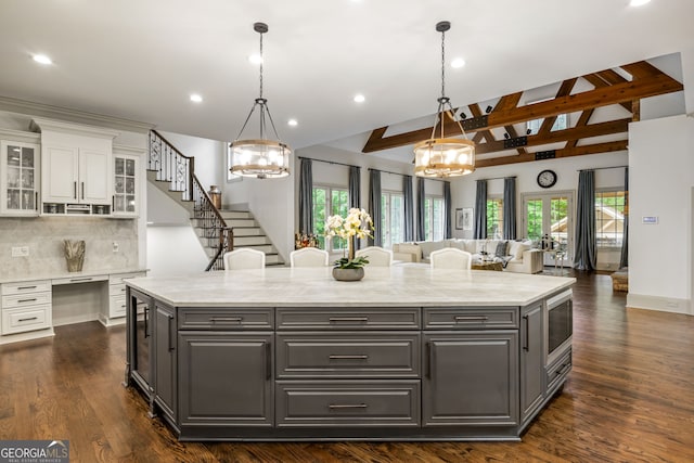 816 Blackfoot Trl, Suwanee, GA 30024 - kitchen featuring gray cabinets, a chandelier, white cabinets, healthy amount of natural light, and recessed lighting