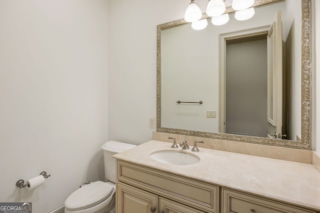 816 Blackfoot Trl, Suwanee, GA 30024 - bathroom featuring toilet and vanity