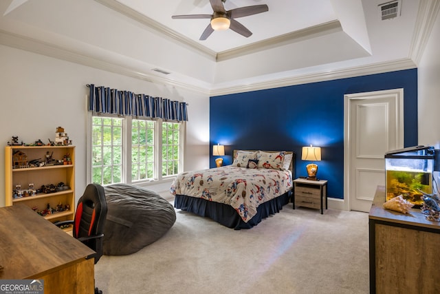 816 Blackfoot Trl, Suwanee, GA 30024 - carpeted bedroom featuring a raised ceiling, ornamental molding, and a ceiling fan